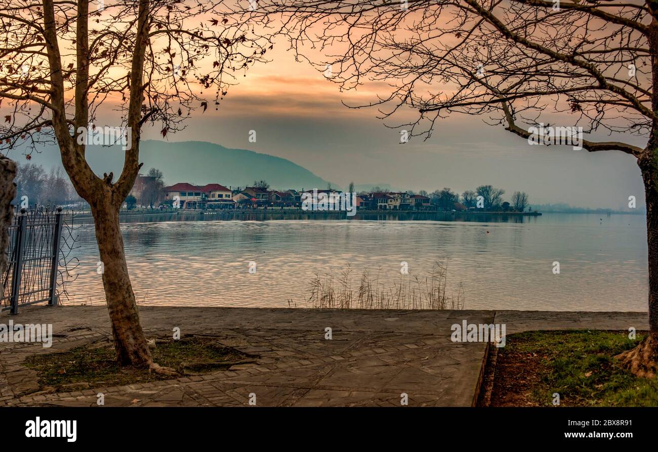 Ioannina city in Greece. View to the lake Pamvotis at sunset Stock Photo