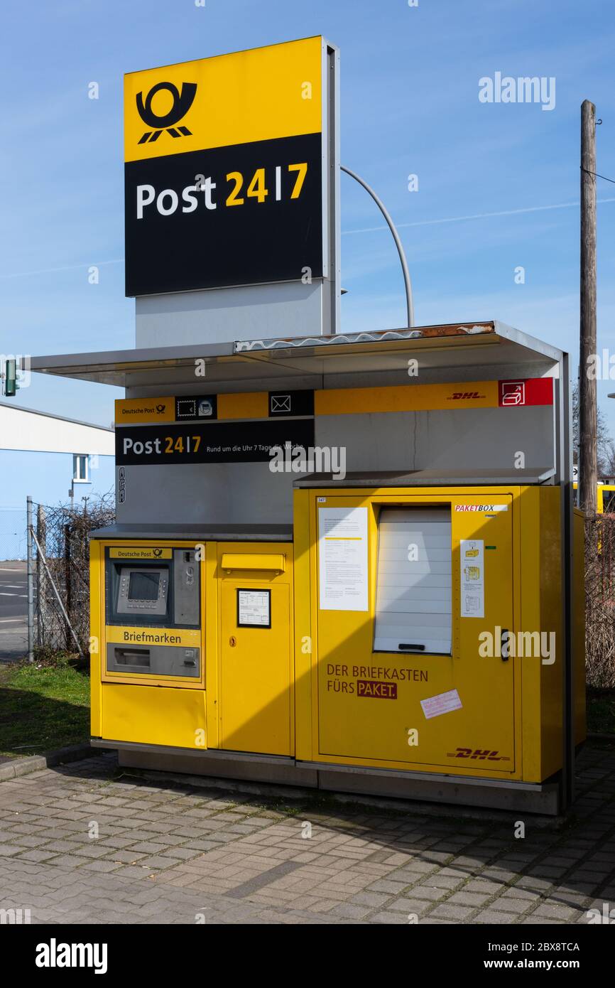 DHL Packstation where customers can pick up their order themselves and also  send packages Stock Photo - Alamy