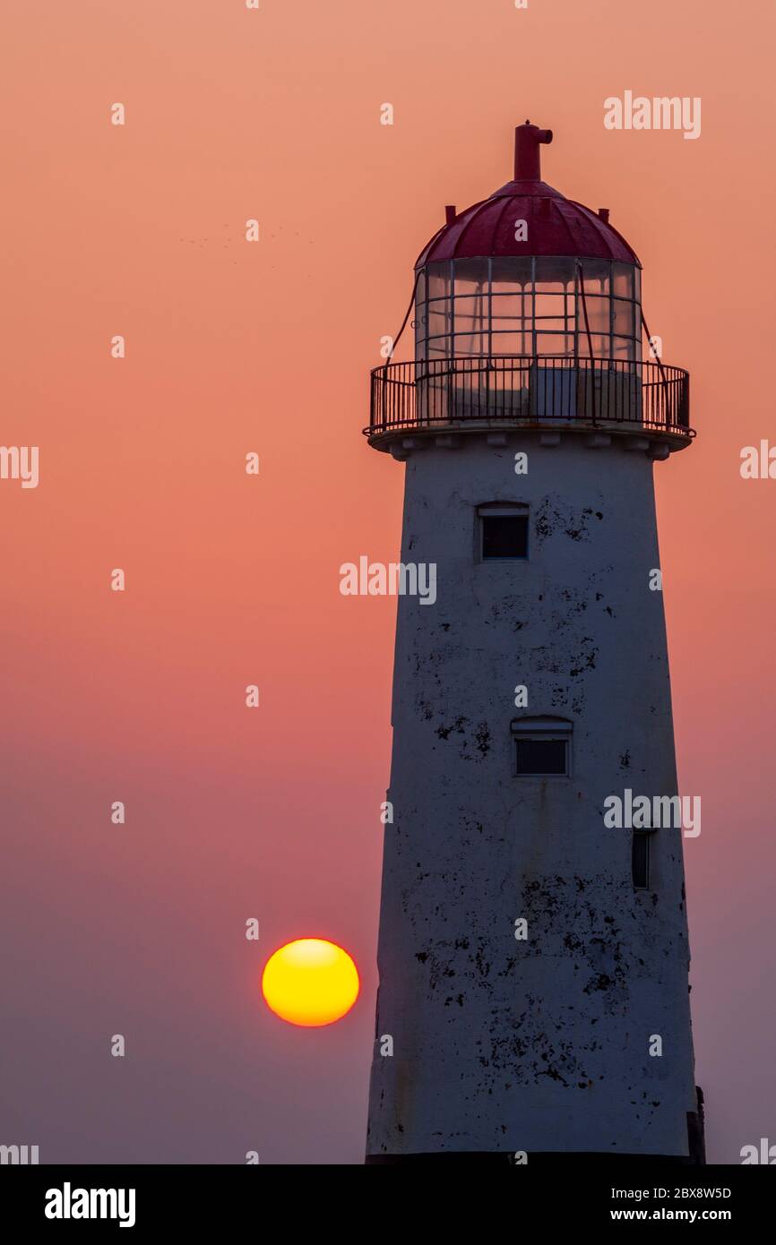 Point of Ayr lighthouse at sunset, Talacre, North Wales Stock Photo