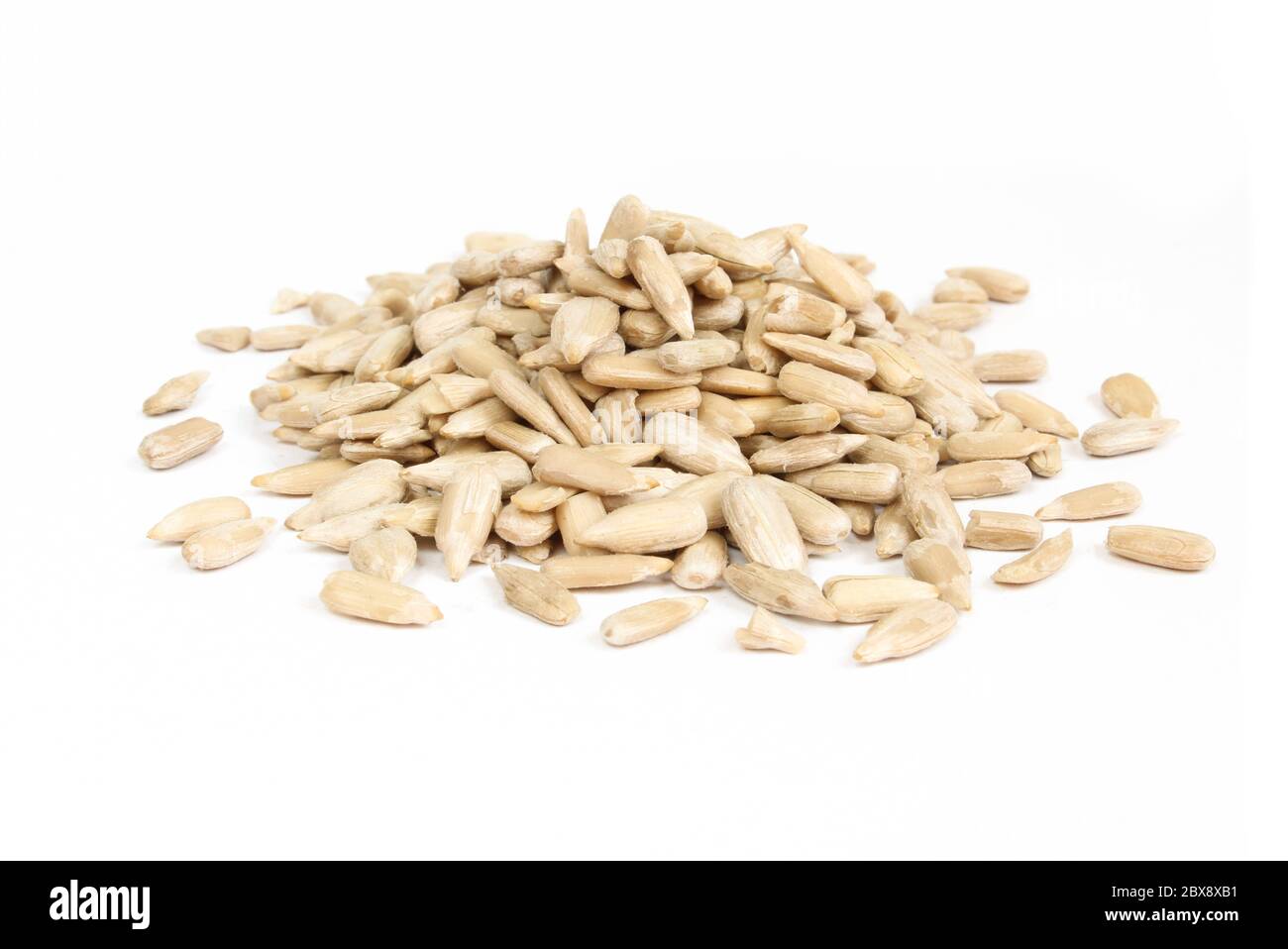 Pile of sunflower seeds without shell isolated on white background