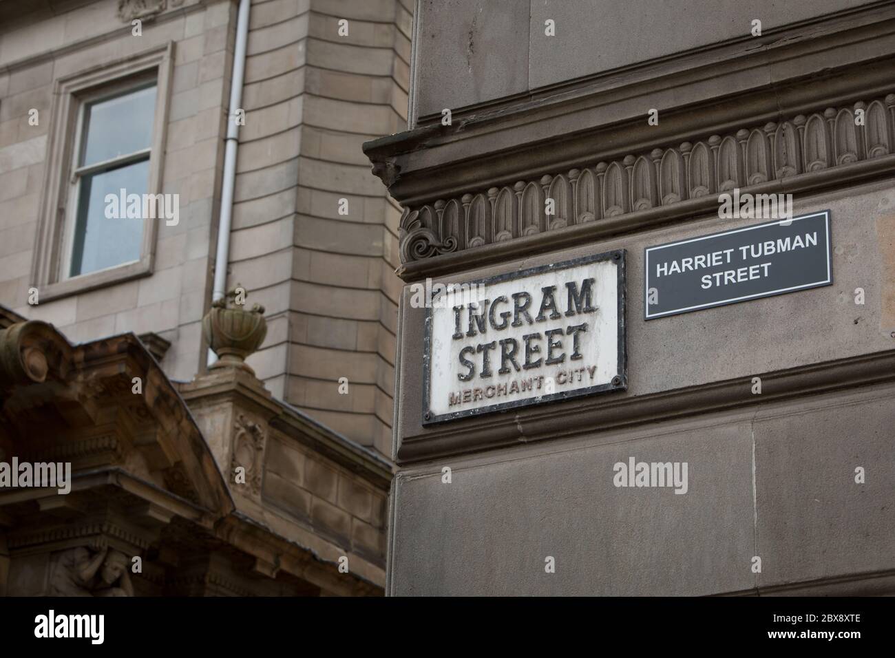 Glasgow, UK, 6th June 2020. Activists of the Celtic FC Green Brigade (ultra-fans) have renamed streets in the Merchant City which commemorate the historical fathers of the city, who had connections with plantations and slavery, with the names of black civil rights activists and slaves, in a protest aimed at drawing attention to Glasgow's connections to slavery. Ingram Street, named after 18th century tobacco lord Archibald Ingram, renamed Harriet Tubman Street after the American abolitionist and political activist who had been born into slavery. In Glasgow, Scotland, on 6 June 2020. Photo cred Stock Photo