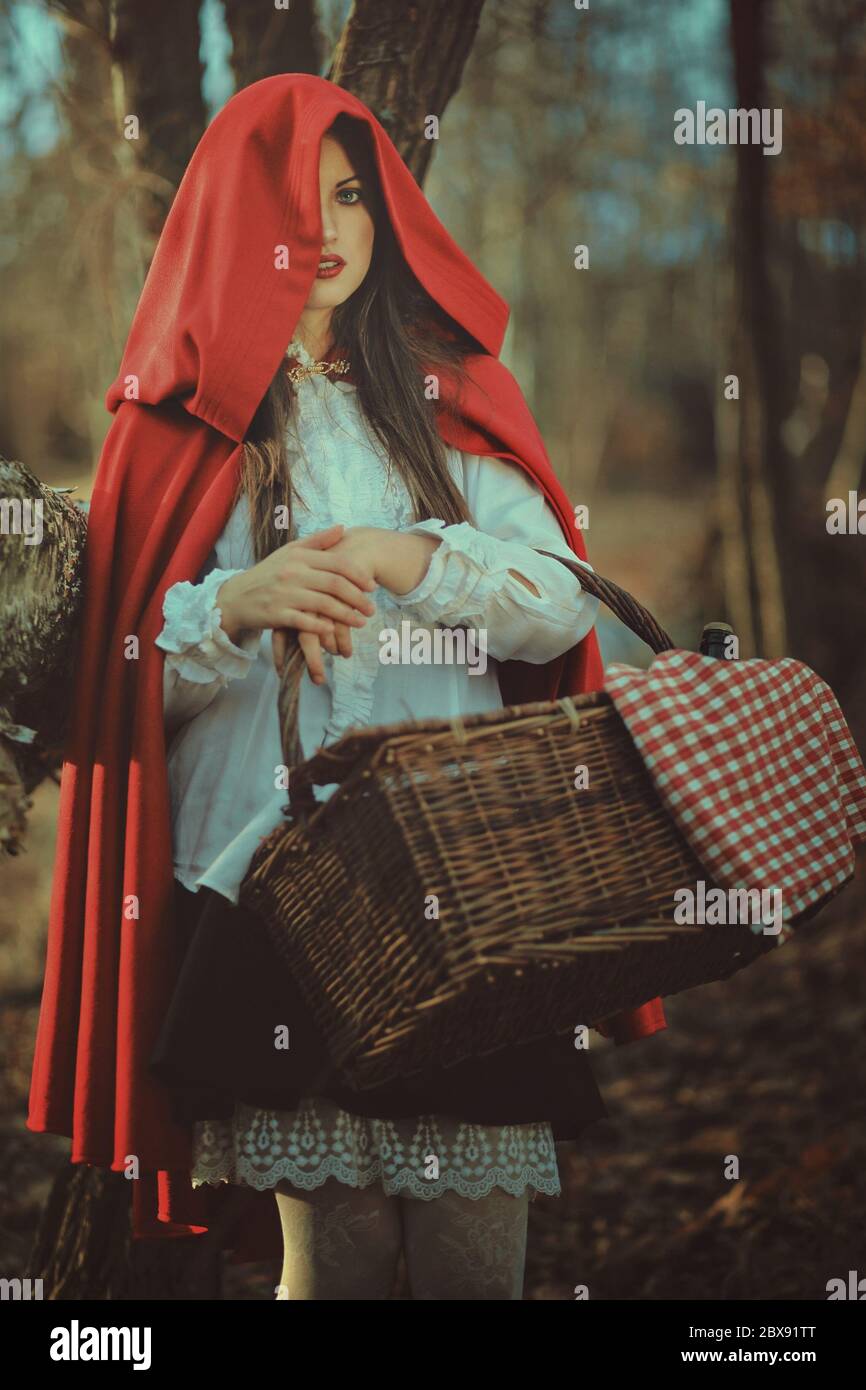 Dark Portrait Of Little Red Riding Hood With Wicker Basket In The Forest Stock Photo Alamy Dark Portrait Of Little Red Riding Hood With Wicker Basket In The Forest Stock Photo Alamy
