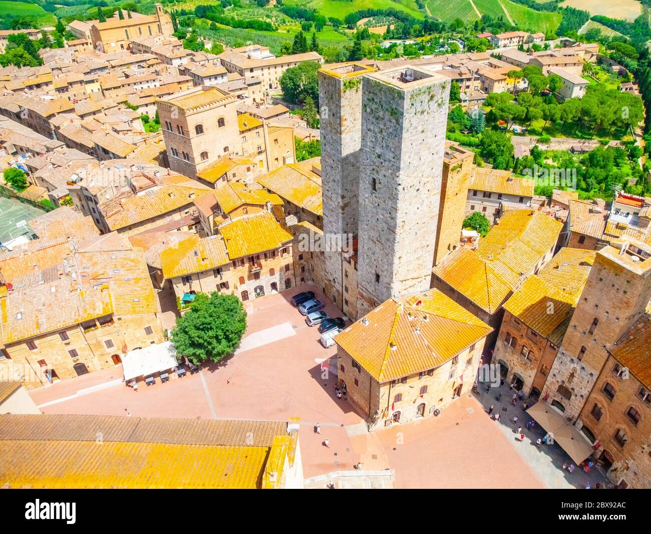 Aerial view of San Gimignano historical city centre with twin towers - Torri dei Salvucci, Tuscany, Italy. Stock Photo