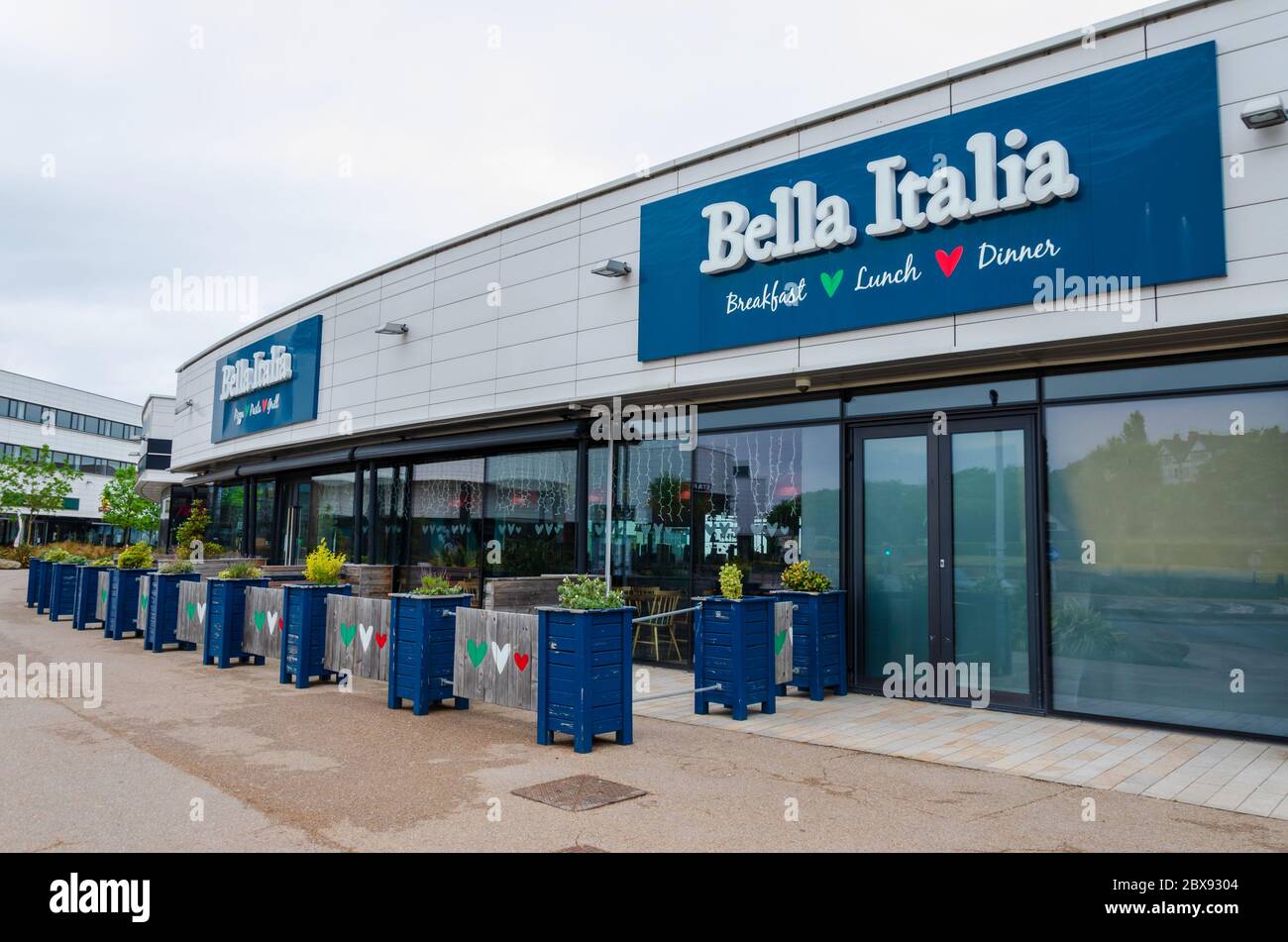 New Brighton, UK: Jun 3, 2020: A Bella Italai restaurant is temporarily closed due to the covid-19 pandemic Stock Photo