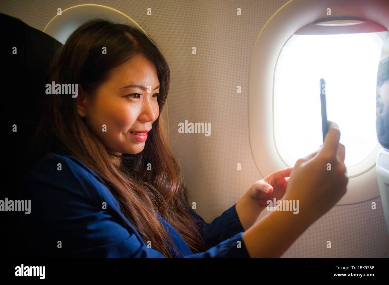 Young Happy And Beautiful Asian Chinese Woman Traveling For Business 