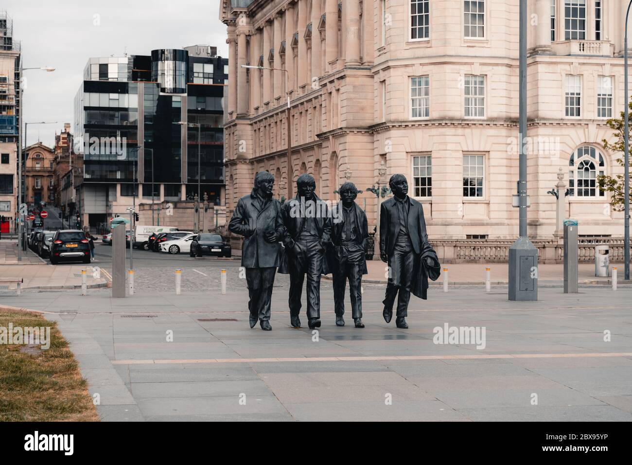 Liverpool, United Kingdom, June 2020: Beatles statues at Liverpool waterfront near the river mersey Stock Photo