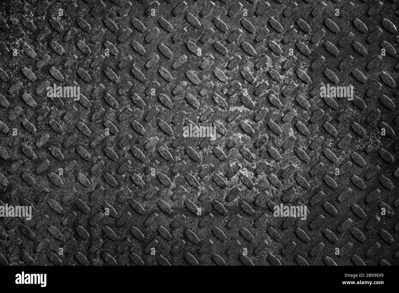 Old and rusty metal floor in black and white. Texture of a rough metal ...