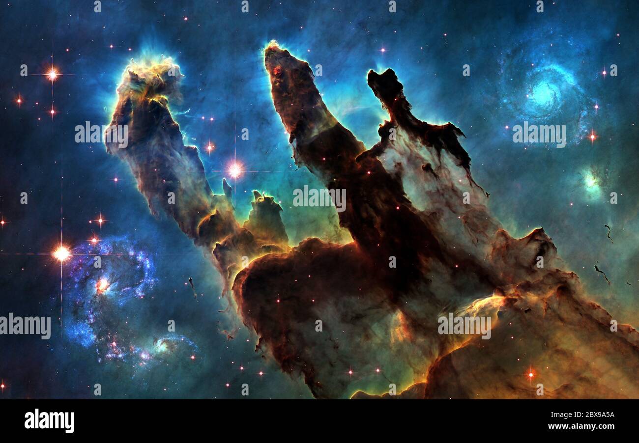 Deep space. Pillars of Creation and galaxies Stock Photo