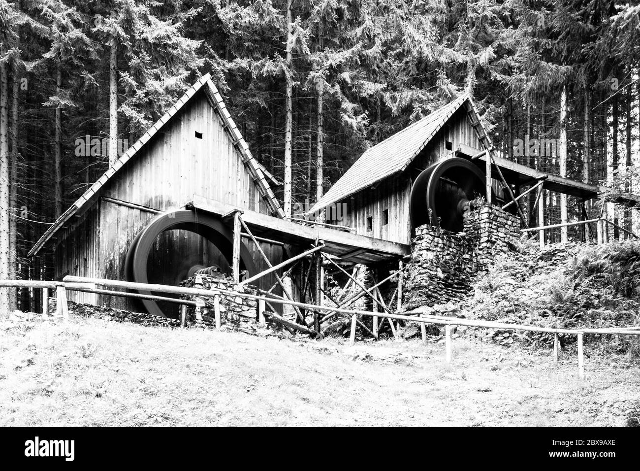 Gold ore mills. Medieval wooden water mills in Zlate Hory, Czech Republic. Black and white image. Stock Photo