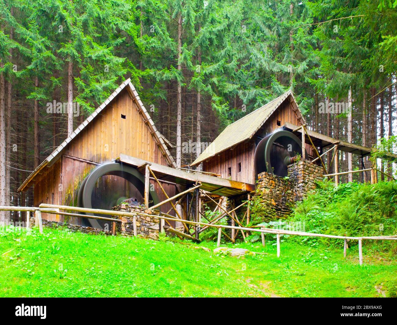 Gold ore mills. Medieval wooden water mills in Zlate Hory, Czech Republic. Stock Photo