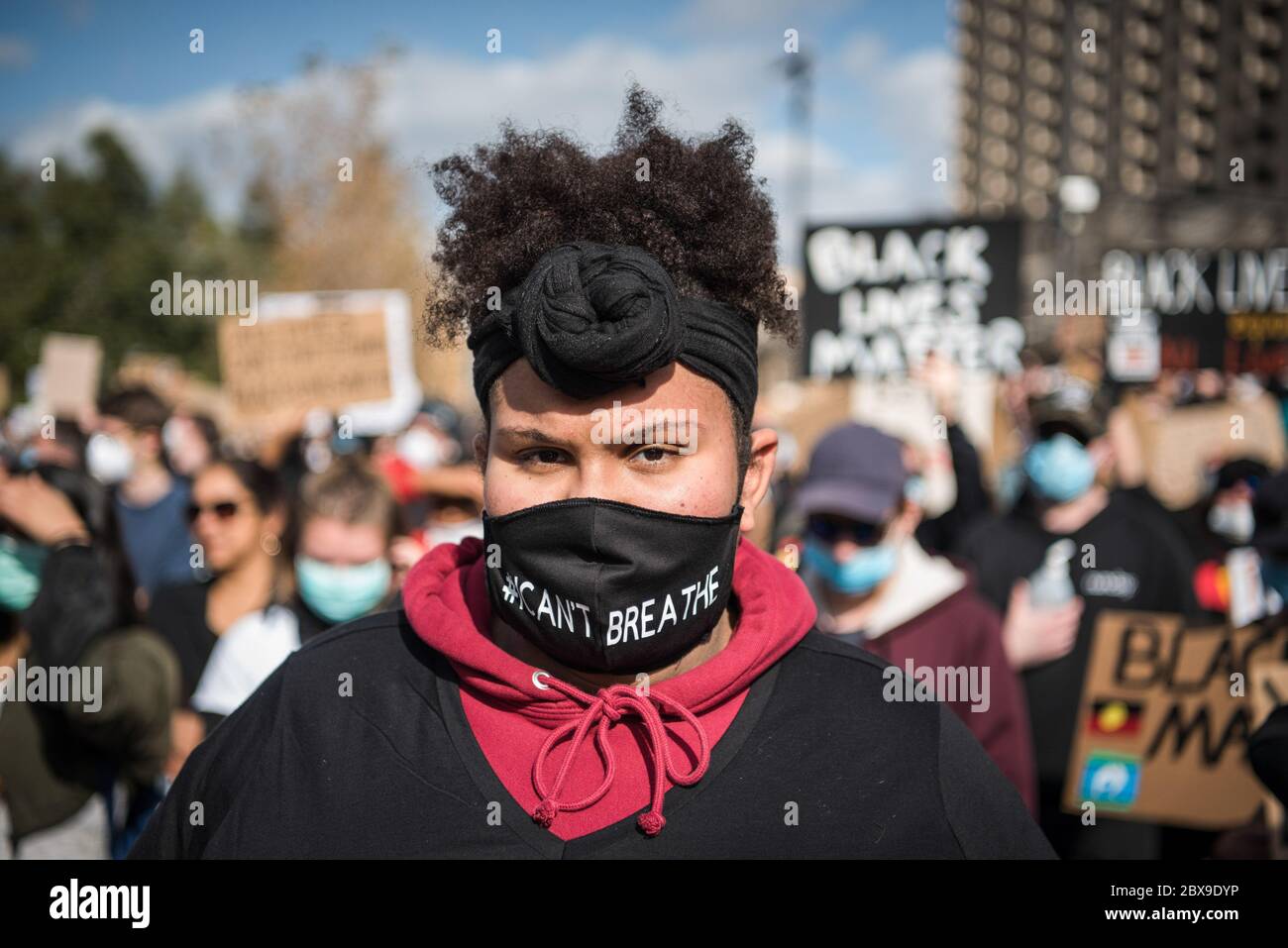 Adelaide, Australia. 06th June, 2020. A protester looks on while wearing a face mask during the demonstration. Thousands of protesters gathered at Adelaide's Victoria Square demonstrating in support of the Black Lives Matter movement and against Aboriginal Australian deaths in custody. Sparked by the death of African American George Floyd at the hands of a white police officer in the US state of Minneapolis, protests were observed in all major Australian cities. Credit: SOPA Images Limited/Alamy Live News Stock Photo