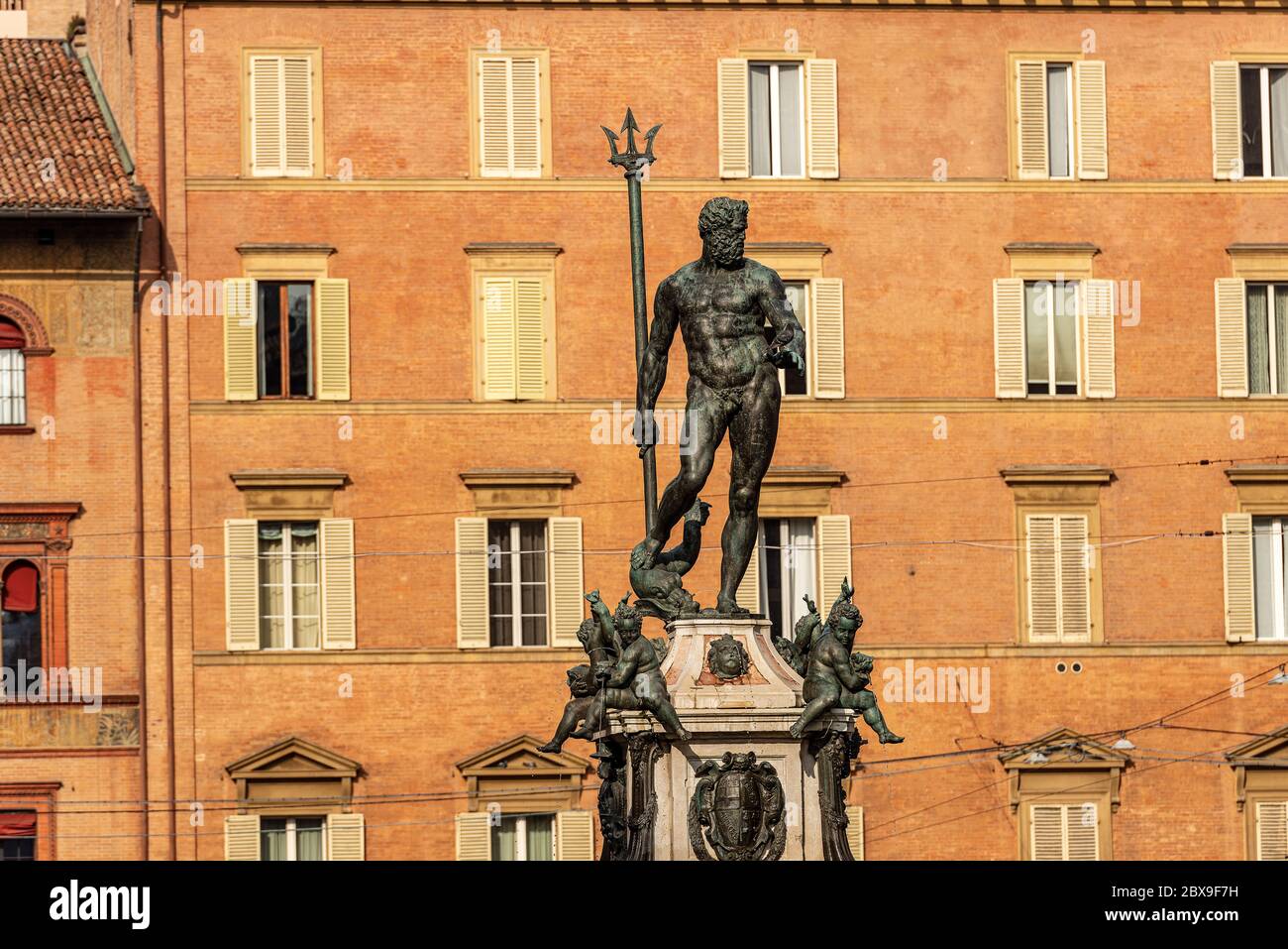 Bronze statue of Neptune (1566), Roman God, fountain in Piazza del Nettuno, Bologna, Emilia