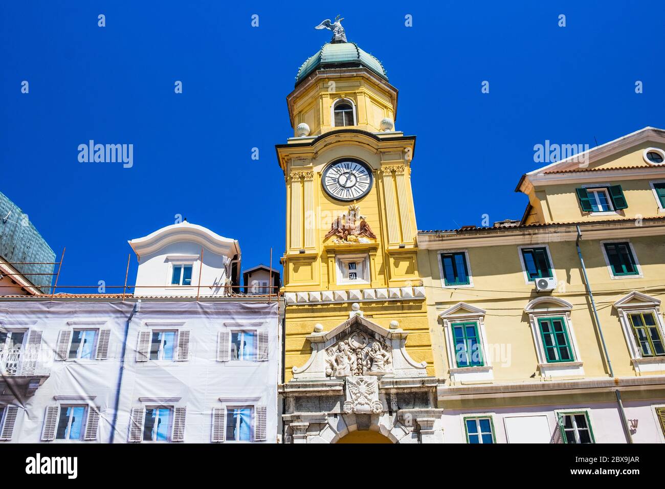 City of Rijeka, Croatia. Baroque city clock tower on a sunny summer day. Stock Photo