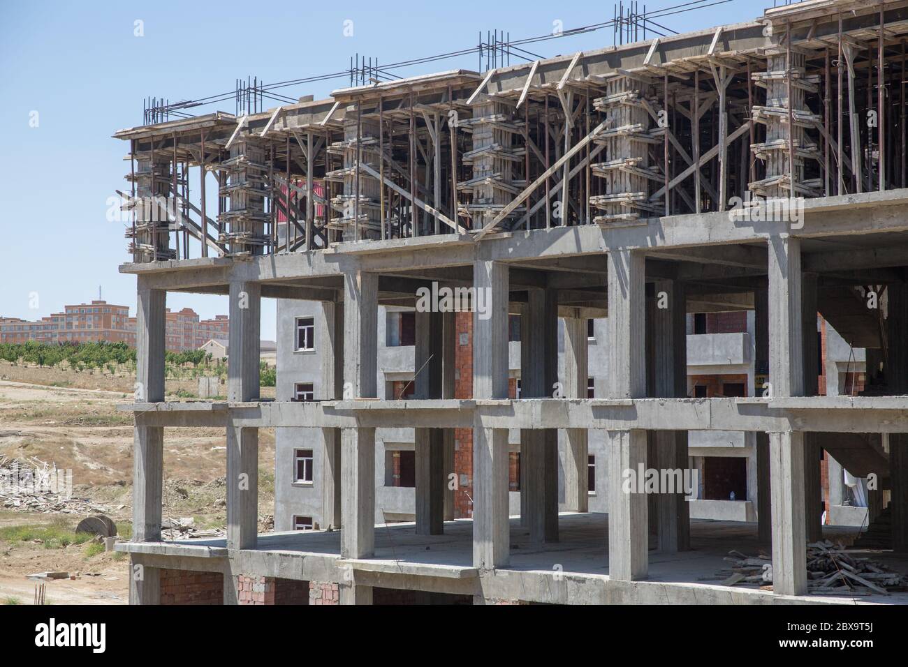 Large construction site including several cranes working on a building ...