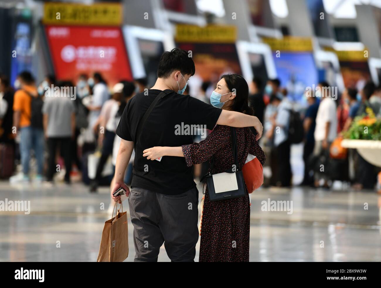Tianjin. 6th June, 2020. Citizens say farewell to each other at the Tianjin west railway station in north China's Tianjin, June 6, 2020. According to the China State Railway Group Co., Ltd., the number of railway passenger trips in May reached 157 million, and an average of 5.08 million per day, up 37.6 percent from April. Credit: Li Ran/Xinhua/Alamy Live News Stock Photo