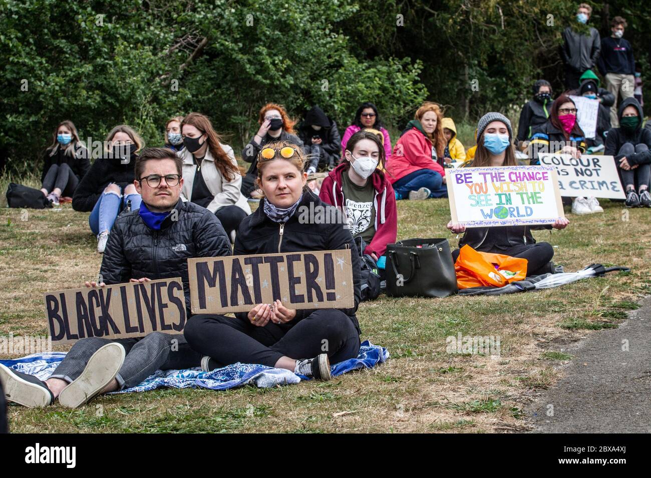 Protesters and demonstrators gather for BLM, Black Lives Matter protest and rally in hill in Hitchin, Hertfordshire, UK Stock Photo