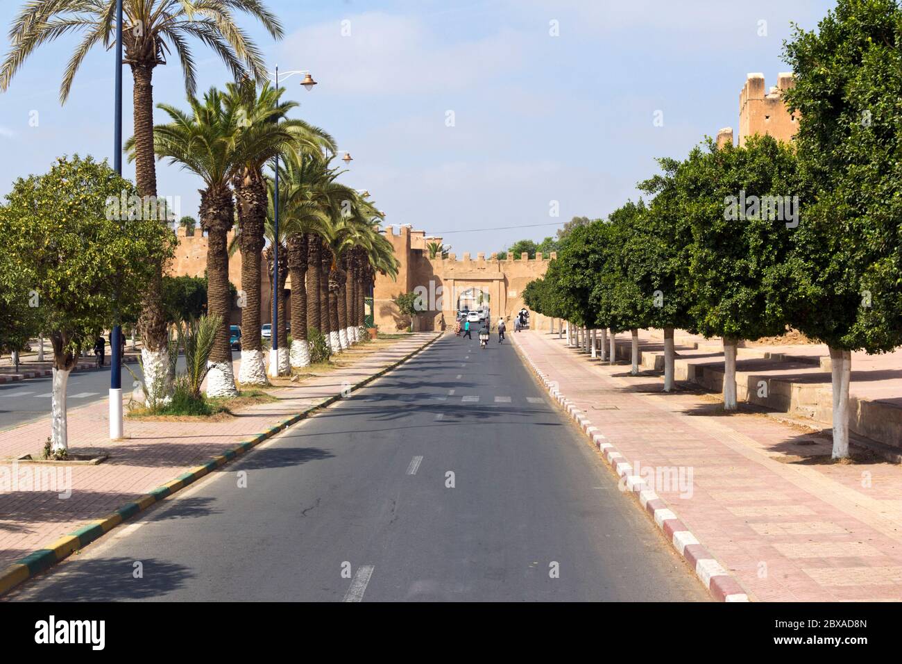 Bab el Kasbah at the end of an tree lined avenue into the Kasbah of Taroudant, Morocco Stock Photo