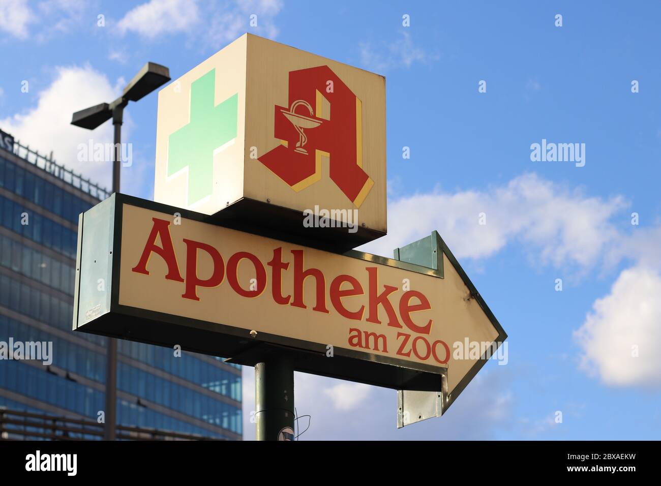 Berlin, Germany - February 12, 2020: Red Pharmacy Sign - Apotheke am Zoo in Berlin, Germany Stock Photo