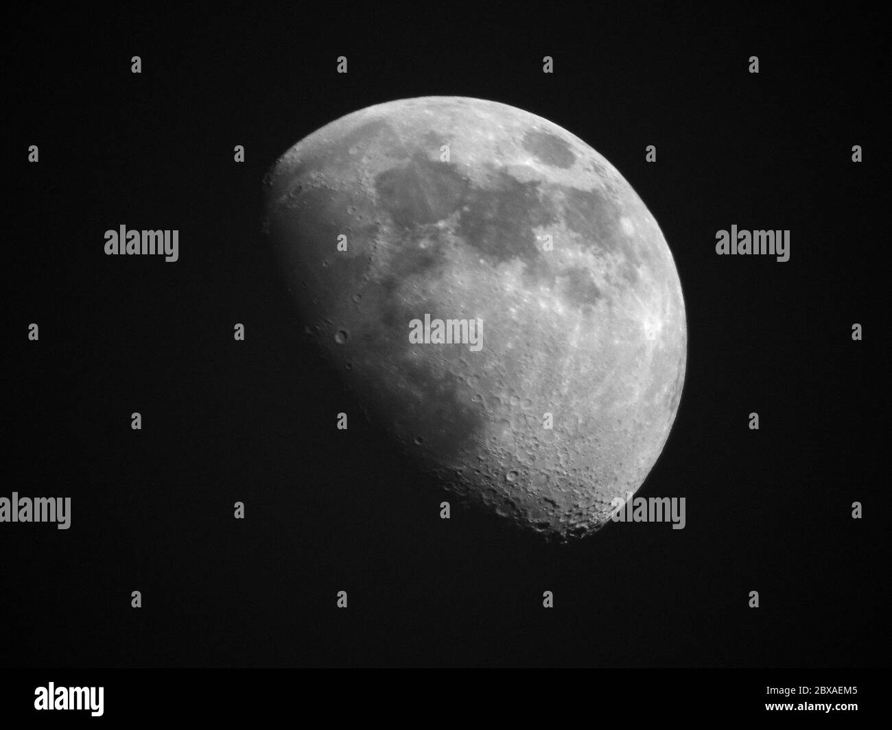 Waxing gibbous moon in a dark sky Stock Photo Alamy