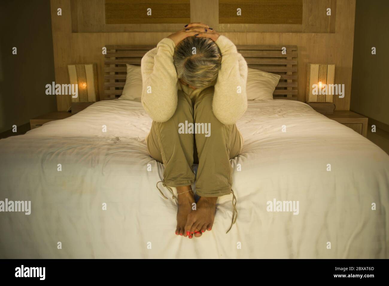 Middle aged woman crying bed hi-res stock photography and images - Alamy