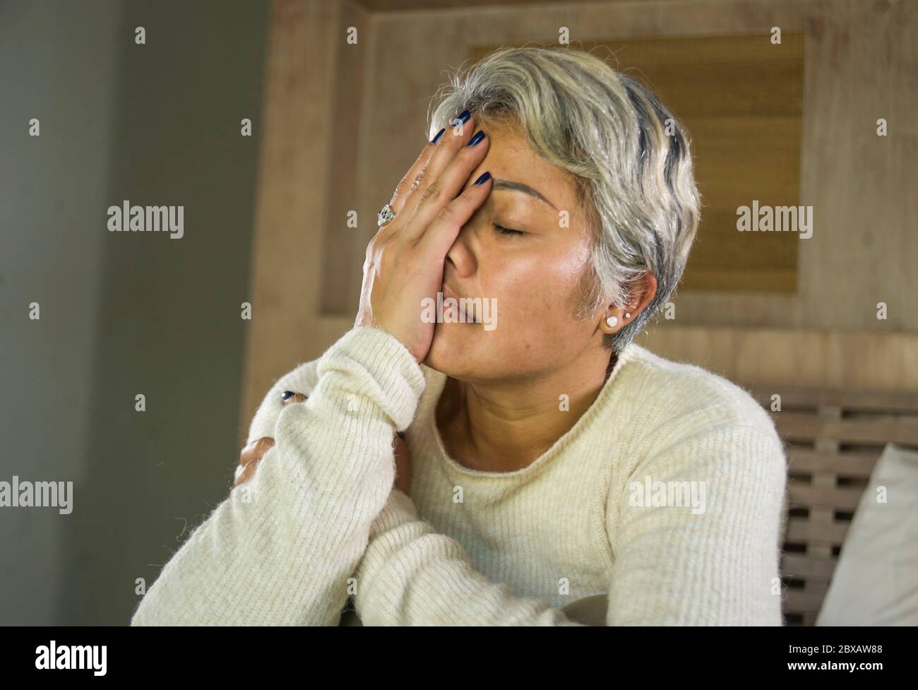 Middle aged woman crying bed hi-res stock photography and images - Alamy
