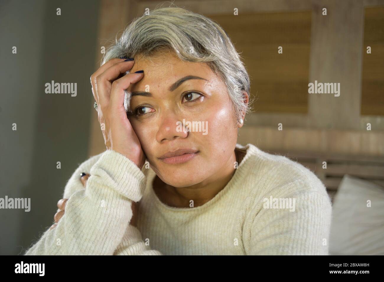 Middle aged woman crying bed hi-res stock photography and images - Alamy