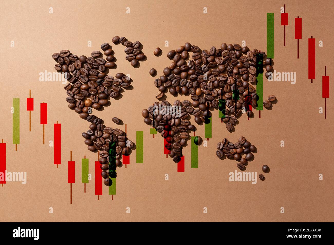 value of coffee in the markets worldwide.World map made with coffee beans on brown background Stock Photo