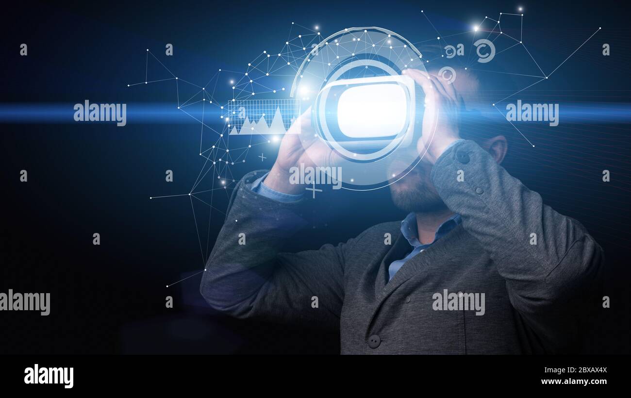Bearded businessman using virtual reality glasses for work Stock Photo