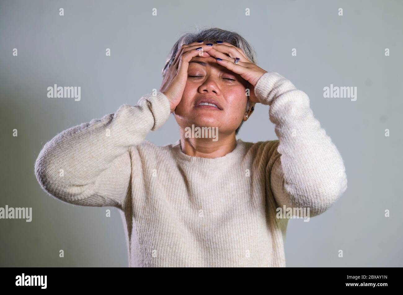Indonesian woman crying hi-res stock photography and images - Alamy