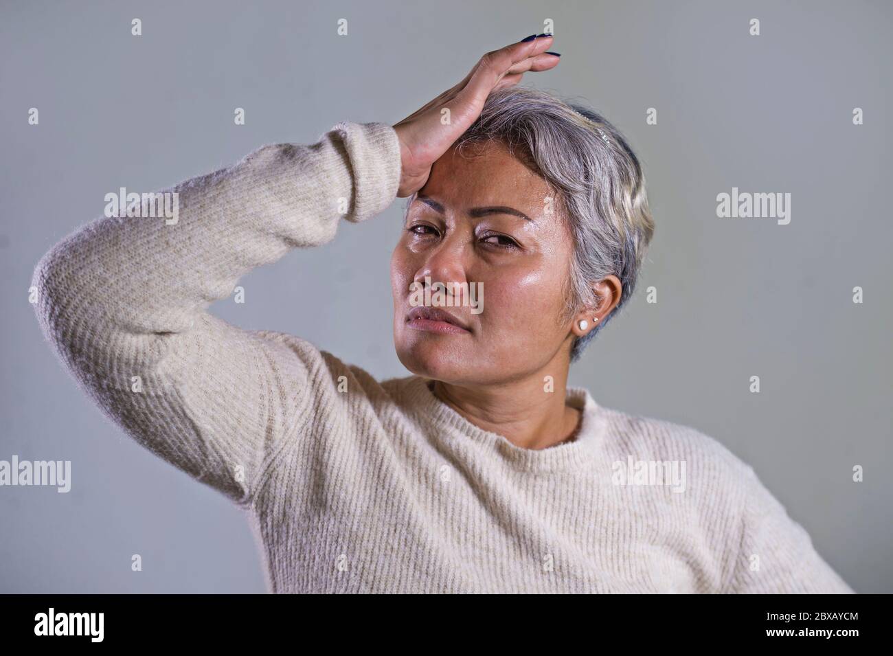 Indonesian woman crying hi-res stock photography and images - Alamy