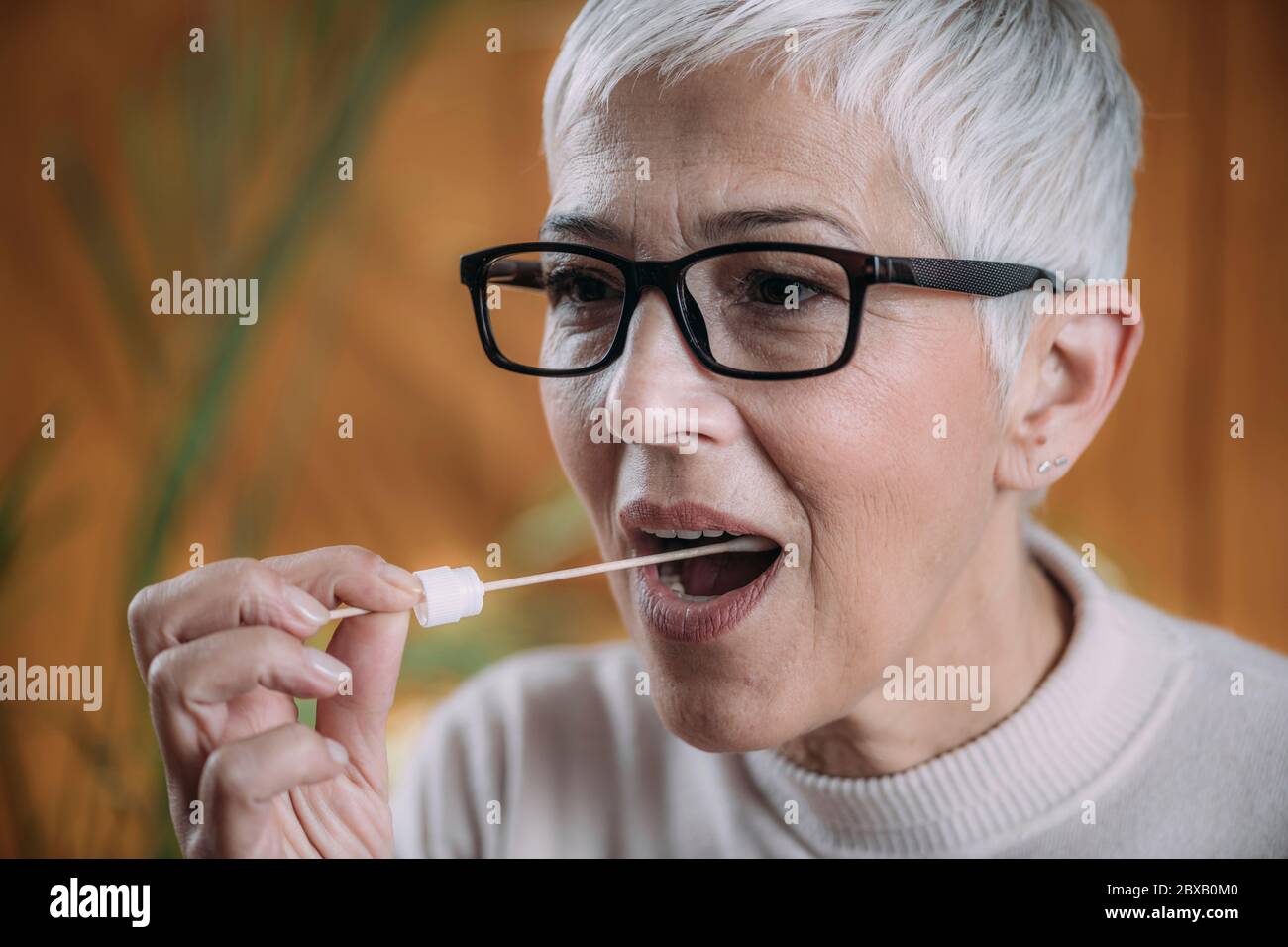 DNA testing using saliva sample Stock Photo Alamy