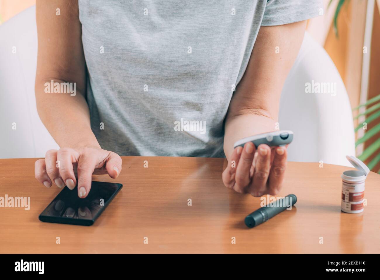 Measuring glucose levels Stock Photo