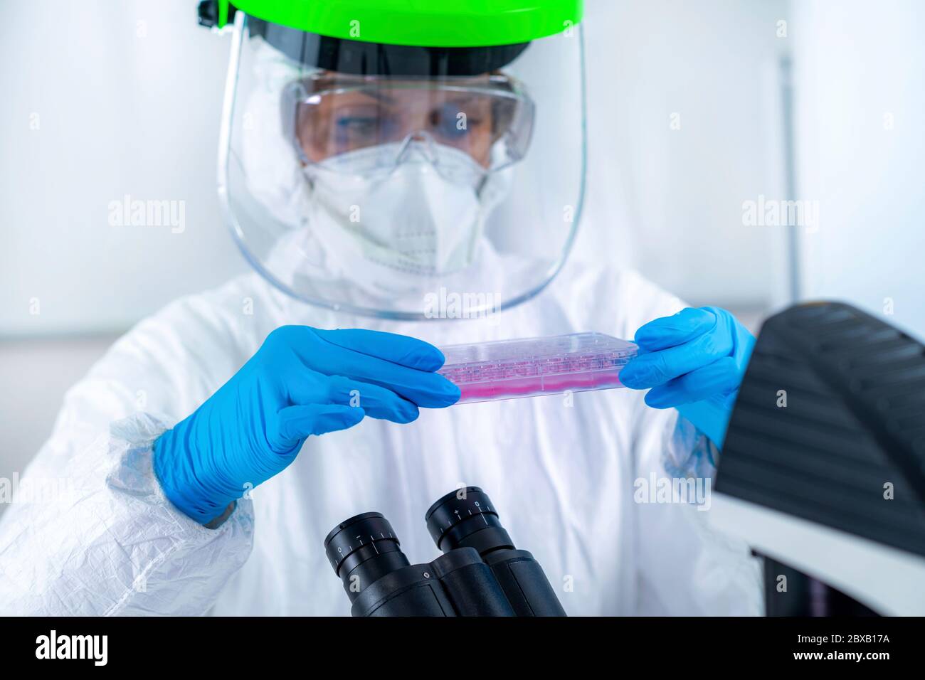 Coronavirus vaccine research scientist in PPE Stock Photo