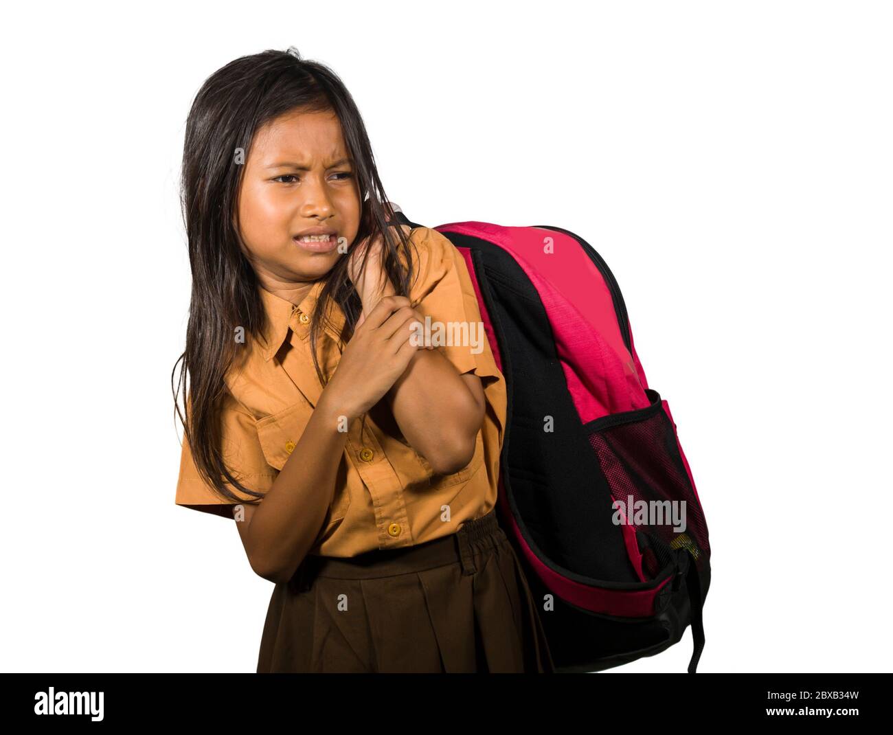 Child carrying heavy school bag hi-res stock photography and images - Alamy