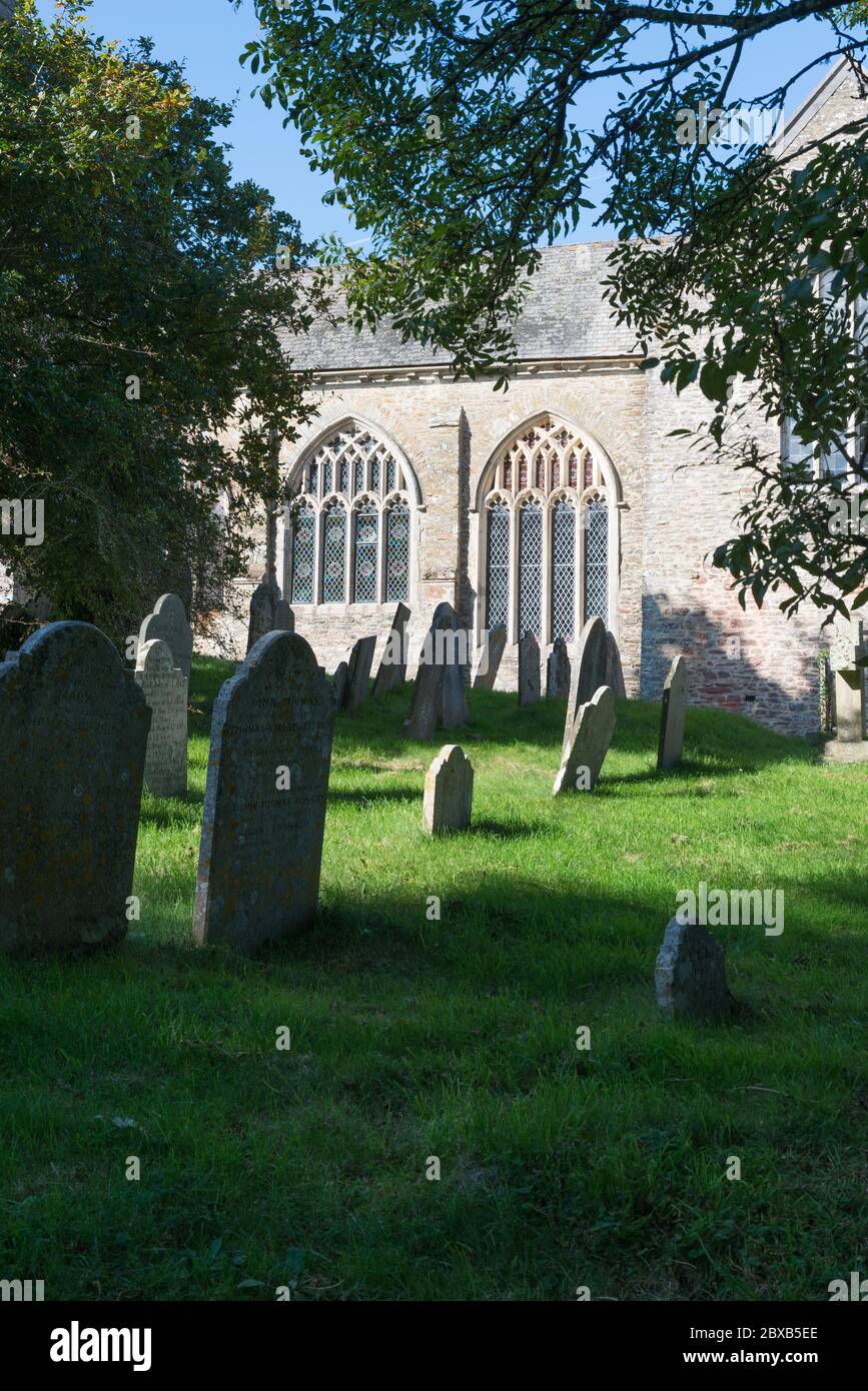 Sunshine on two arched windows of St. George's church in Modbury South ...