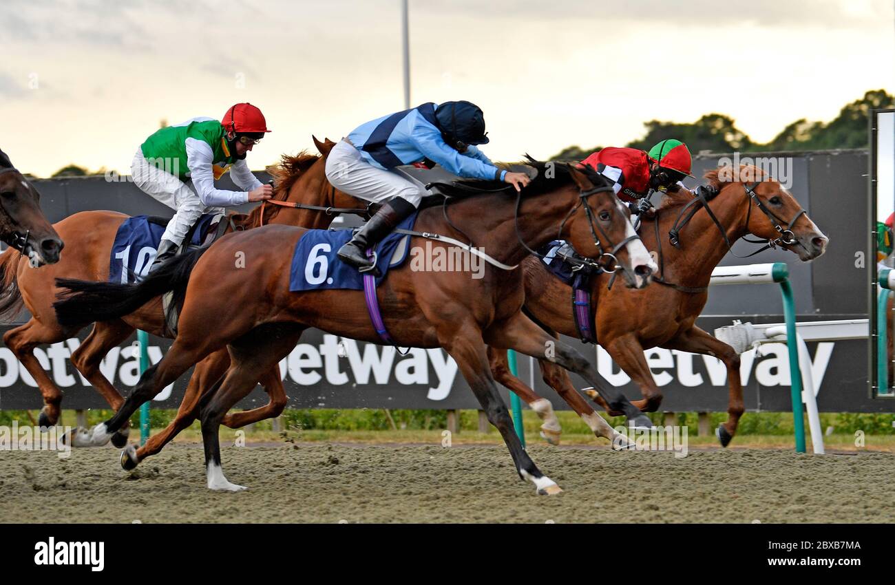 Coverham ridden by Ryan Tate (6) wins the Betway Handicap at Lingfield Racecourse. Stock Photo