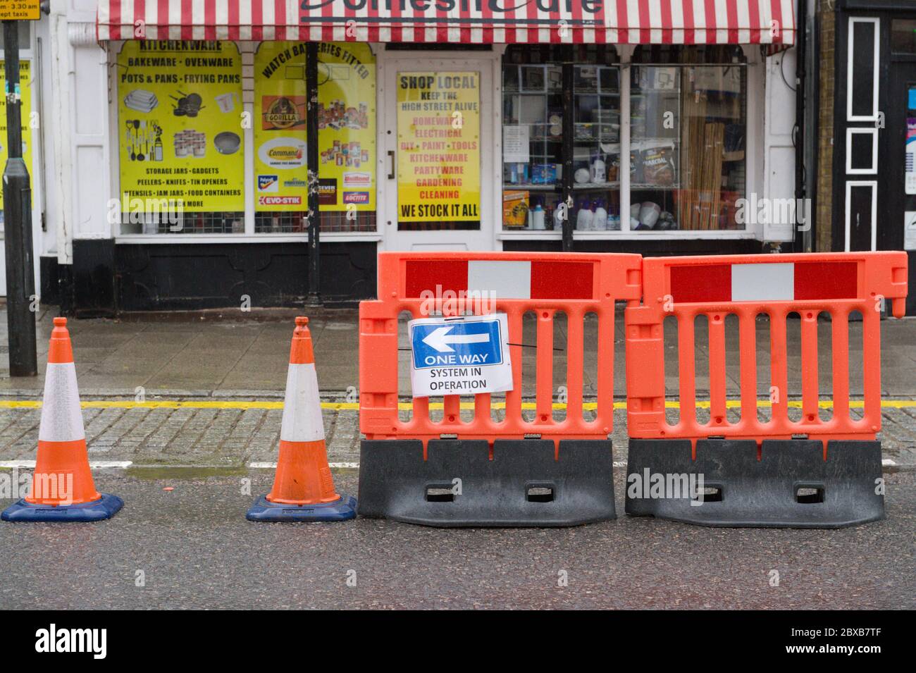 Ware, UK. 6th June, 2020. Rainfall and thunderstorms over Hertfordshire, UK. The main road through Ware has been turned in to a one way street to help with social distancing and to help prevent spread of coronavirus (COVID-19). Credit: Andrew Steven Graham/Alamy Live News Stock Photo