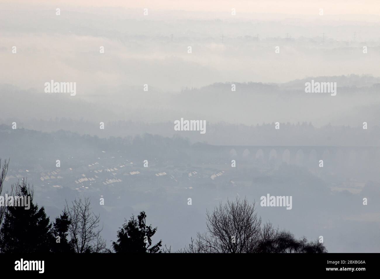 Traphont Cefn Mawr Viaduct and village of Cefn on a foggy springtime morning Stock Photo