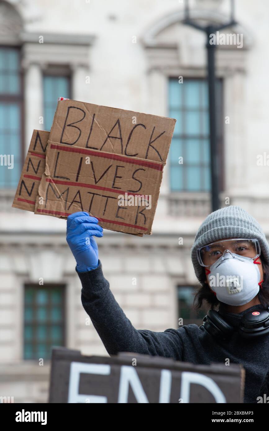 Black man holding campaign sign hi-res stock photography and images - Alamy