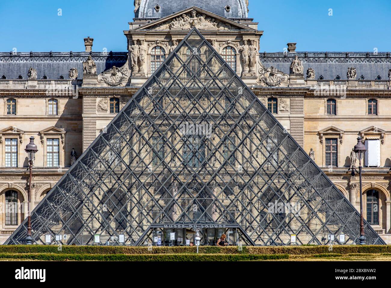 Paris, France - May 29, 2020: Louvre museum as seen from Jardin des Tuileries in Paris Stock Photo