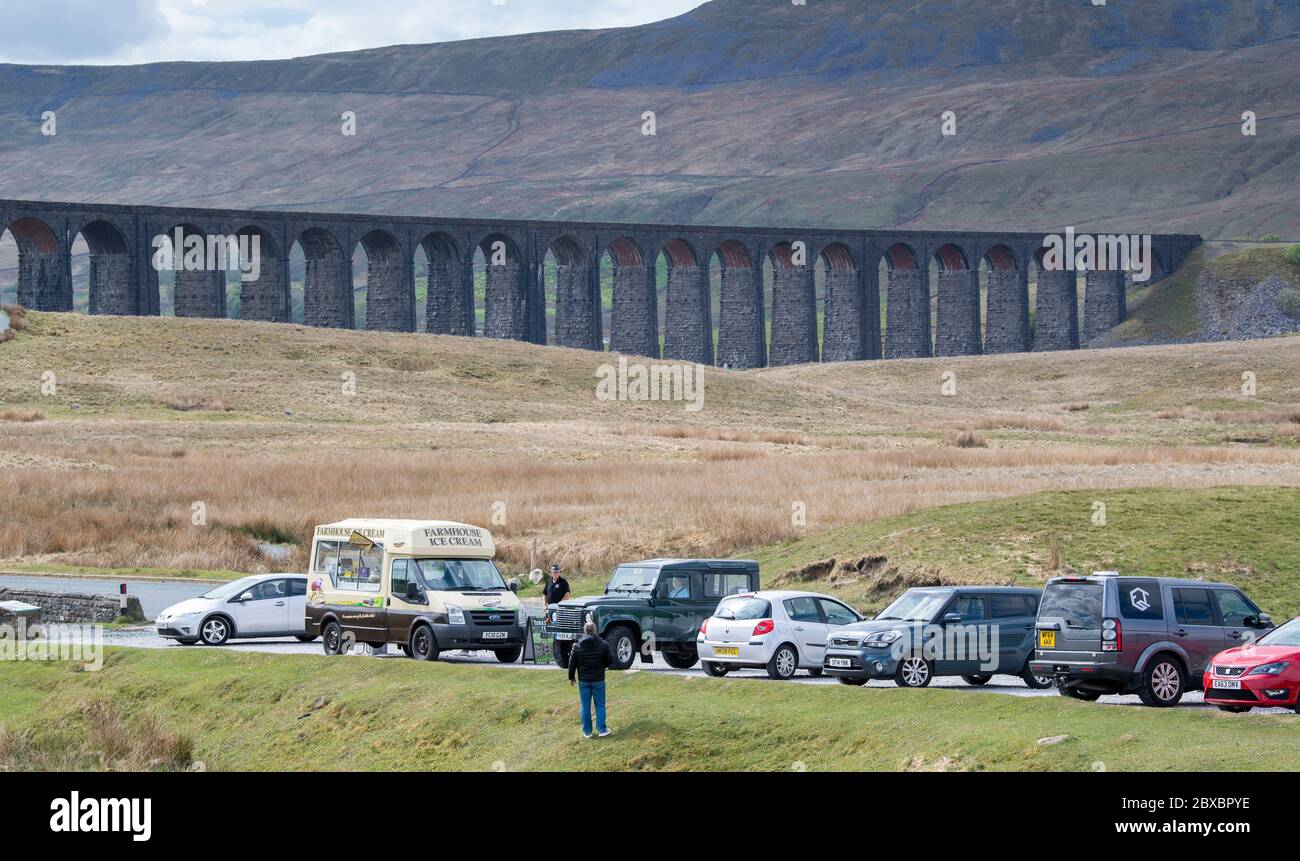 Ribblehead Viaduct, North Yorkshire, UK13th May 2020. Visitors free from travel restrictions visit Ribblehead in the Yorkshire Dales, where an Ice Cre Stock Photo