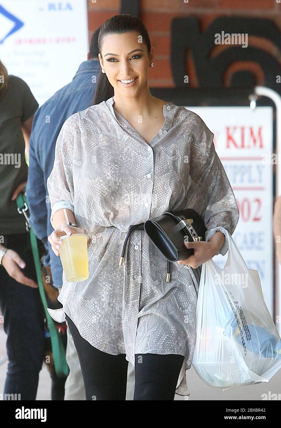 Kim Kardashian grabs a drink and some snacks from a health food shop, Calabasas, California. 2011 Stock Photo