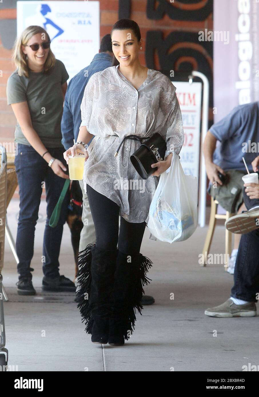 Kim Kardashian grabs a drink and some snacks from a health food shop, Calabasas, California. 2011 Stock Photo