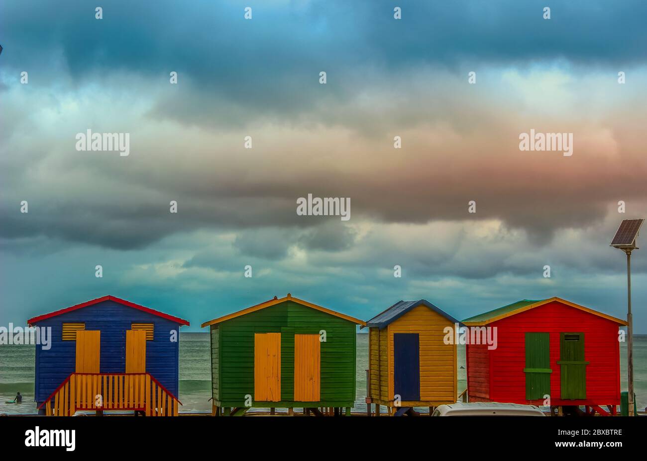 Colorful changing rooms in St James beach Cape Town near Muizenburg beach Stock Photo