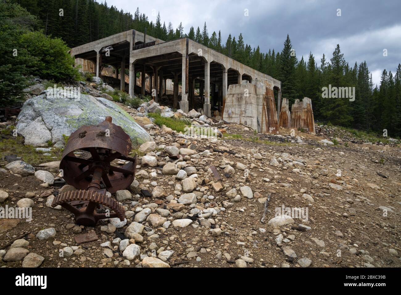 Only foundations and scattered pieces of machinery remain of Elkhorn mill, once the largest mill in Montana, located near the ghost town of Coolidge. Stock Photo