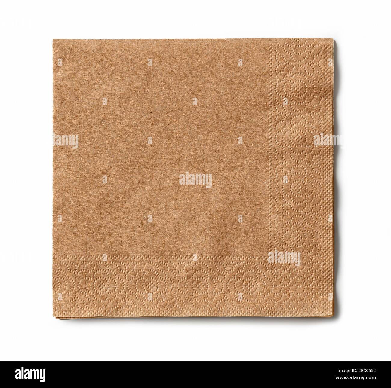 brown paper napkin isolated on white background, top view Stock Photo