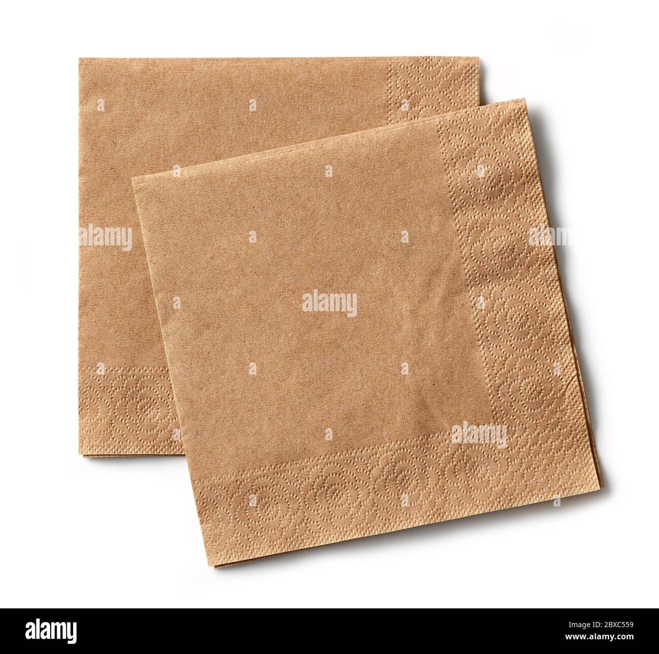 two brown paper napkins isolated on white background, top view Stock Photo