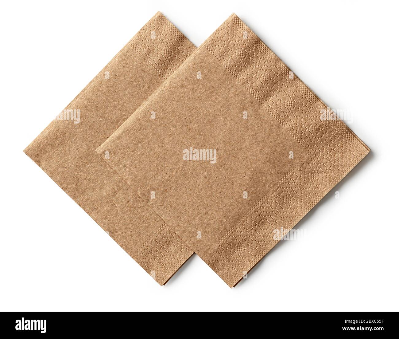 two brown paper napkins isolated on white background, top view Stock Photo