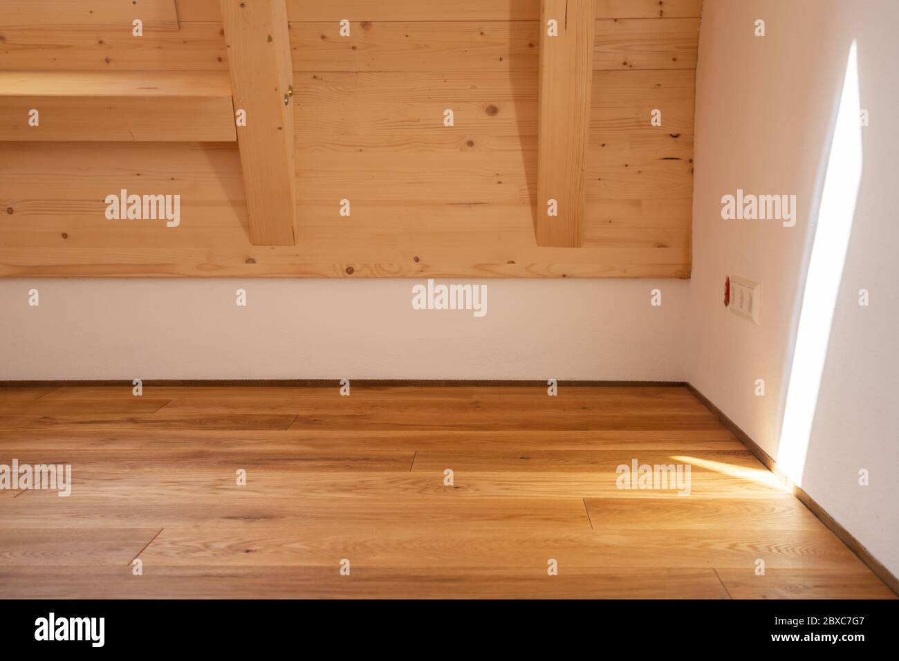 Luxury oak parquet flooring after applying of oilbased floor finish, which tend to enhance the