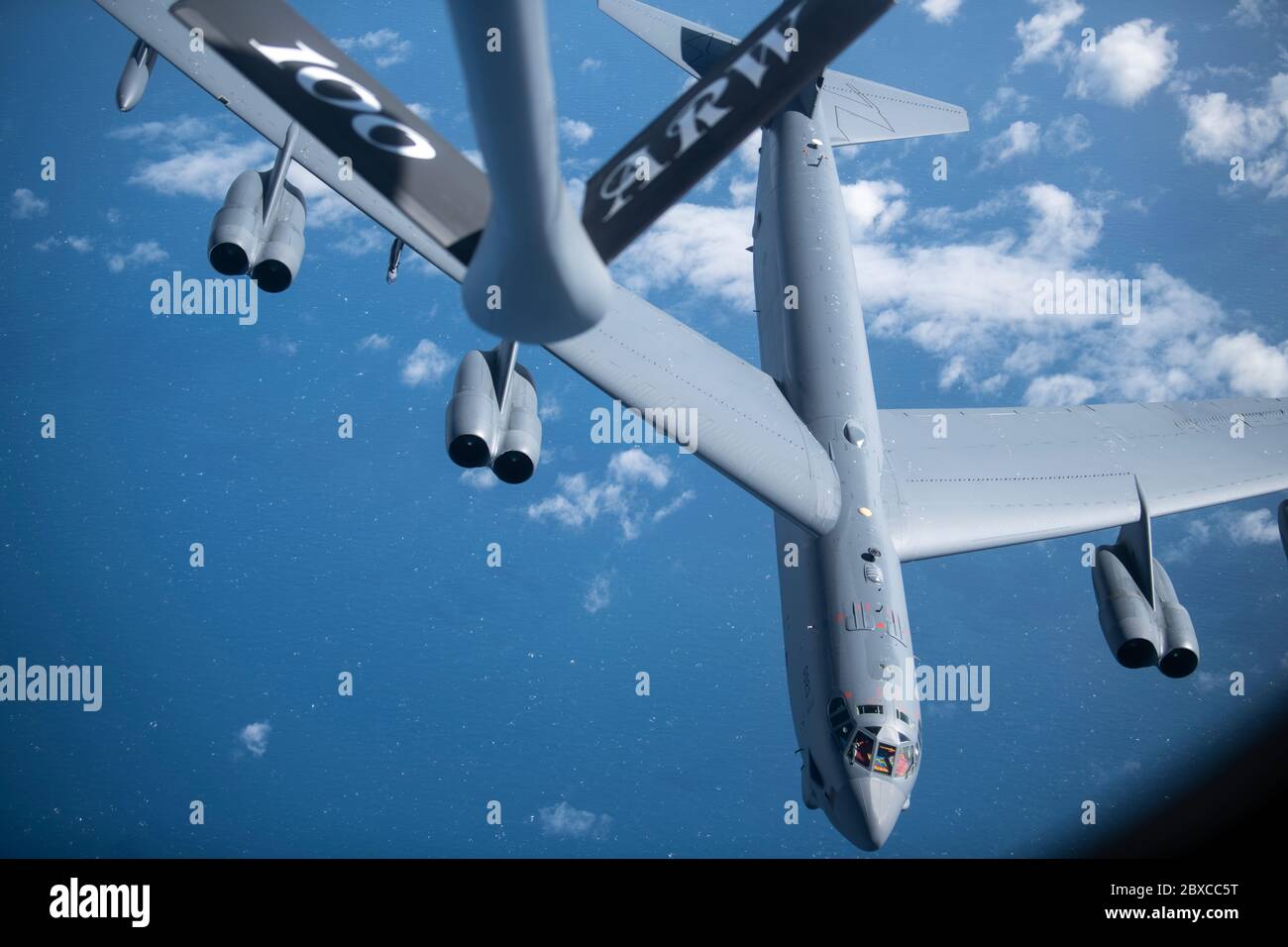 A U.S. Air Force B-52 Stratofortress bomber aircraft from the 5th Bomb Wing, breaks away from a KC-135 Stratotanker aircraft after refueling during a strategic bomber mission June 3, 2020 off the northern Norwegian coast. Stock Photo